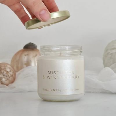 A White Nest Mistletoe and Winterberry Soy Candle
